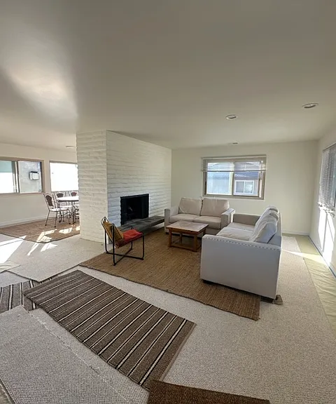 Dining and living room with gas fireplace