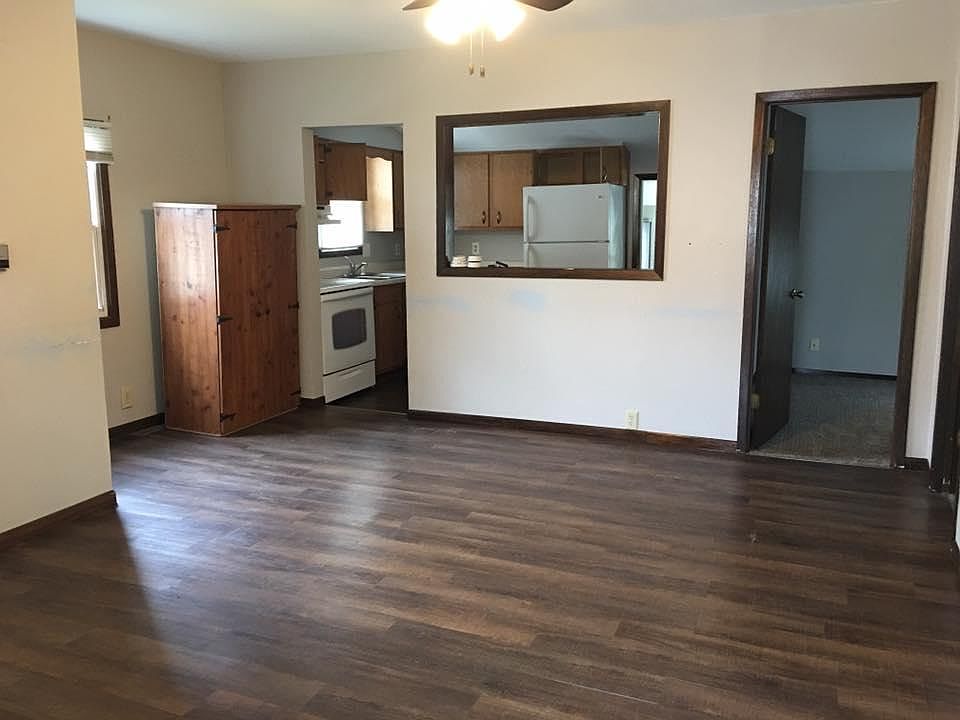 Living Room. View of kitchen and bedroom #2.