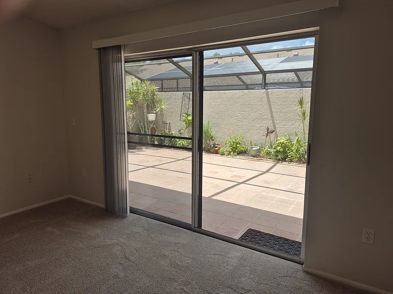 Lounge, with view of open patio space.
