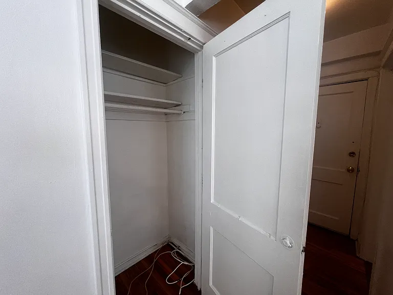 One of two closets in entry foyer.