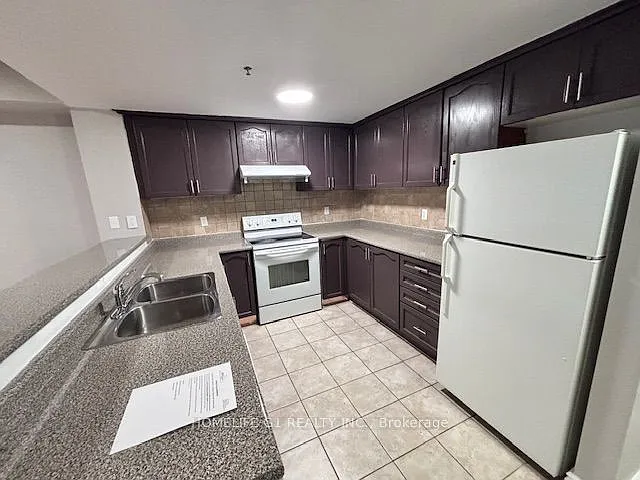 7428 Markham Rd #104 — Photo 24