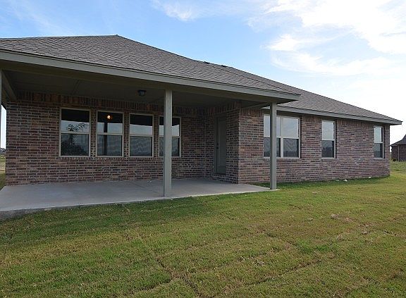 Relax on this huge covered patio