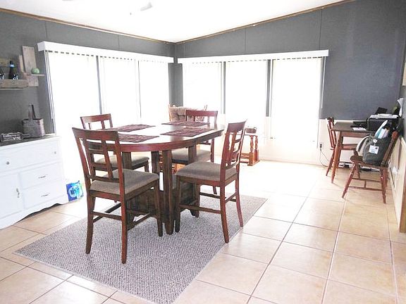 Bright and open dining area with those same beautiful floors.