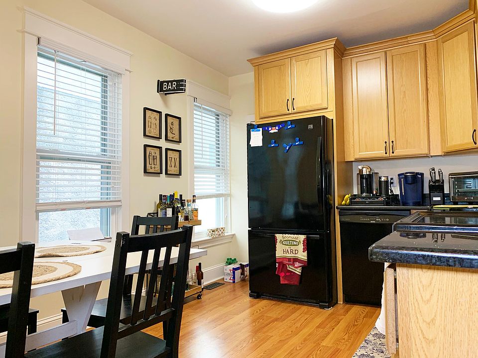 This apartment has a well-lit kitchen, with room for a medium sized kitchen table.
