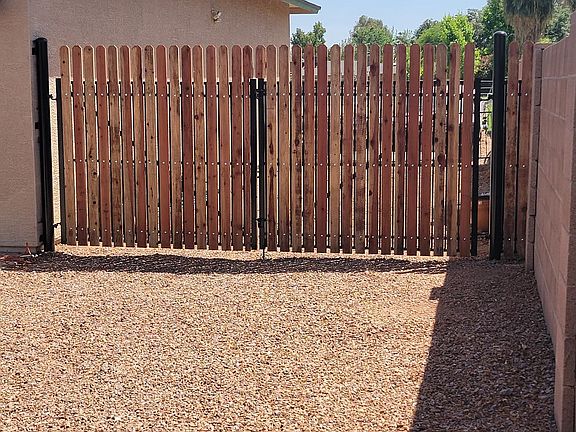 RV gate and parking to the West of garage.