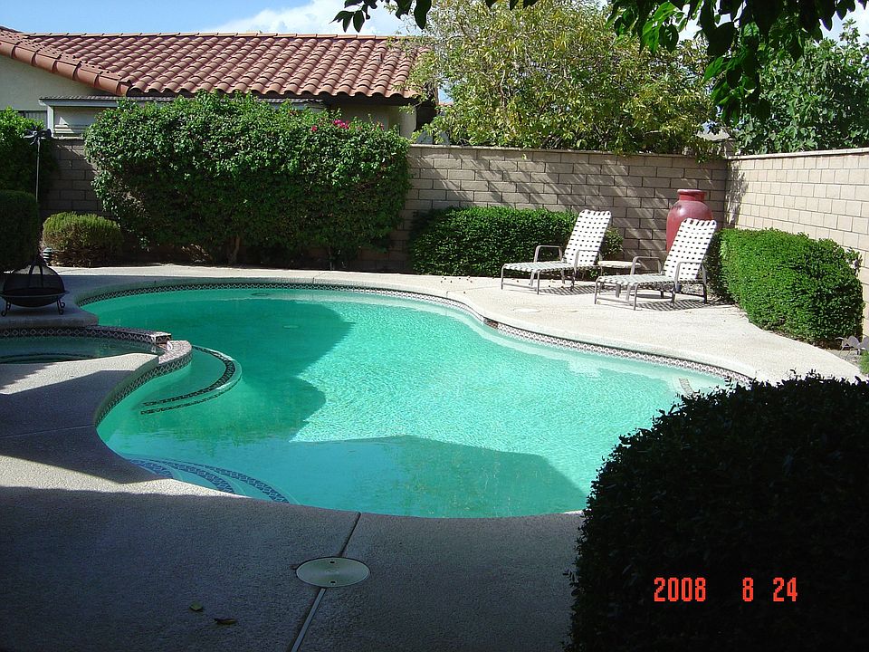 Fabulous backyard with pool and spa plus surrounded by a block wall. 
