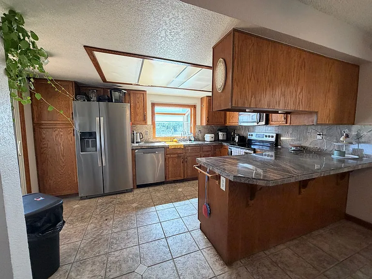 3410 S Halifax Way — Photo 2