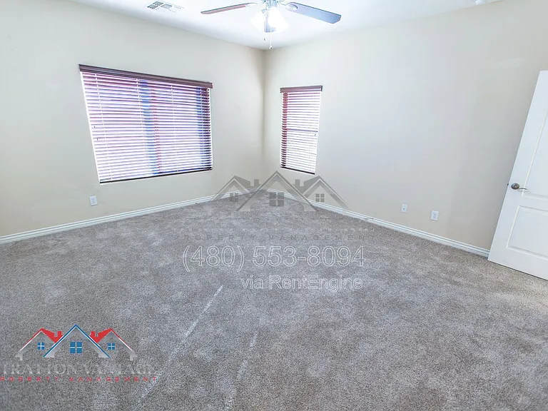 11751 W Daley Ln — Photo 33