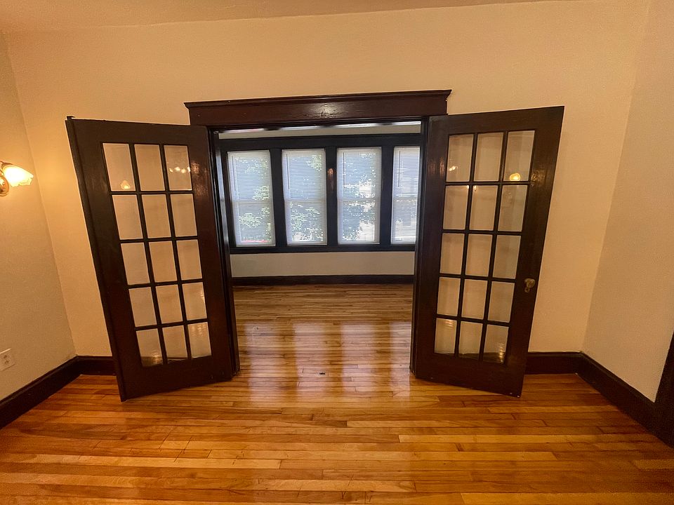 French doors open to Sunroom