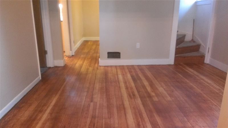 wood floors in dining room, kitchen and 1 bedroom
