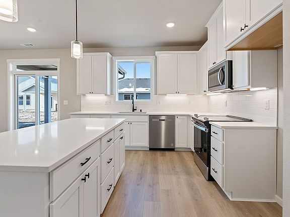 7106 S Holly ST by Aho Construction