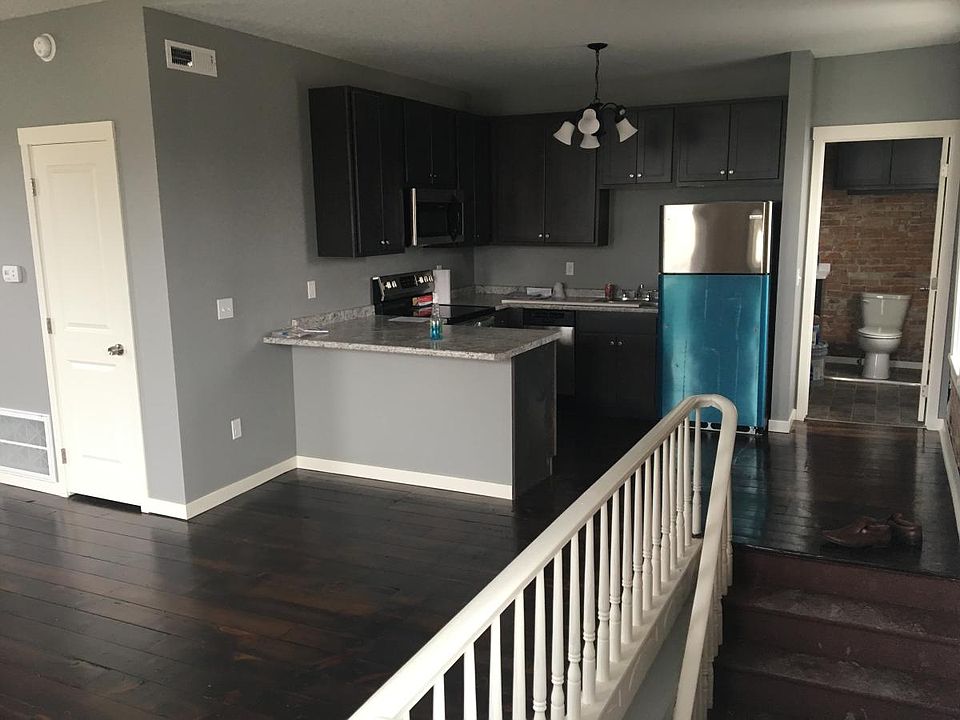 Adorable kitchen with new appliances.