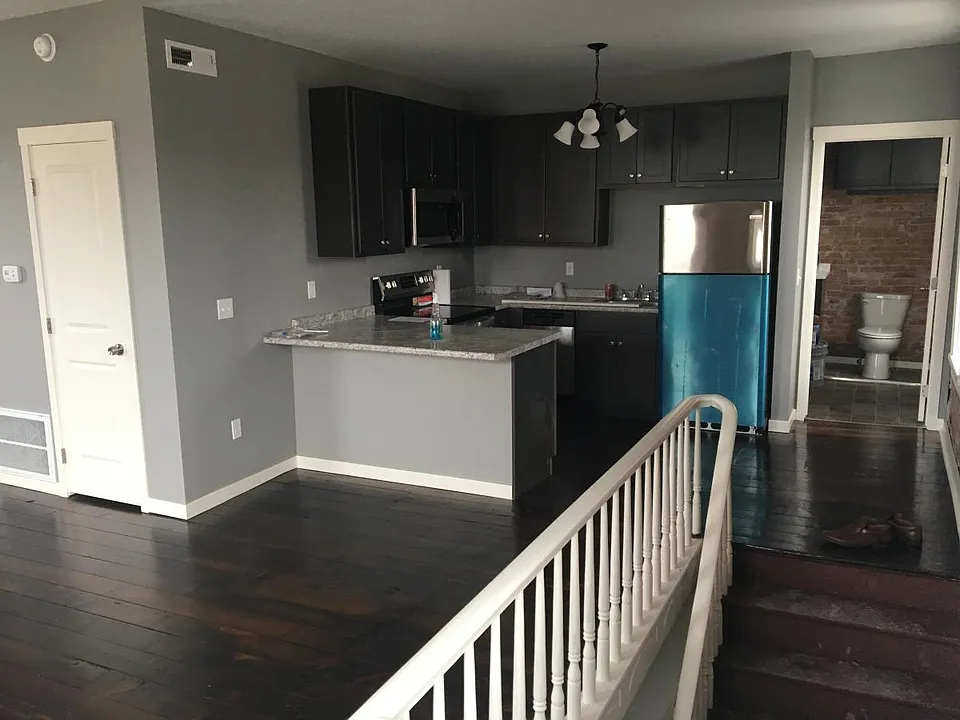 Adorable kitchen with new appliances.