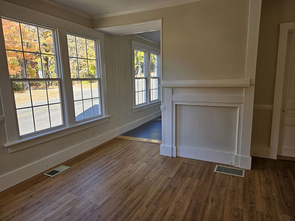 Additional view of bedroom with partial view of living room to left rear
