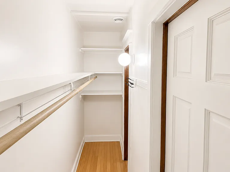 Large/long hall closet (note that bedrooms do not have dedicated closets)