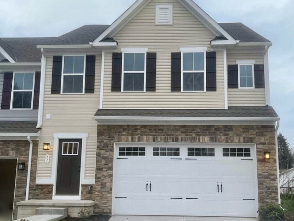 Beautiful 3-story end-unit townhouse exterior.