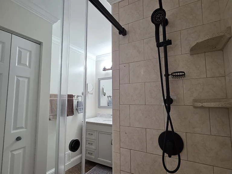 Sliding barn doors, extra wide shower head and handheld