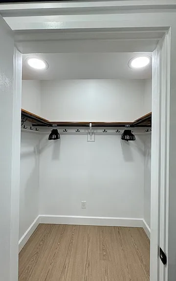 Primary Bedroom's walk-in closet