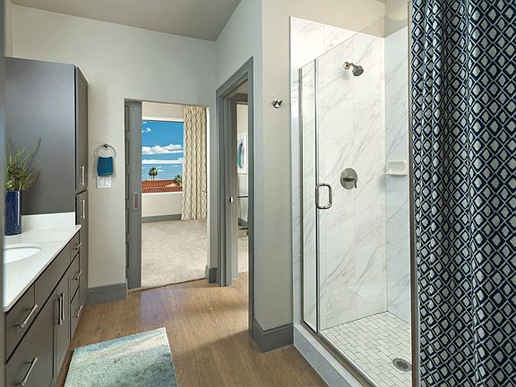 Carrara-tile surround showers
