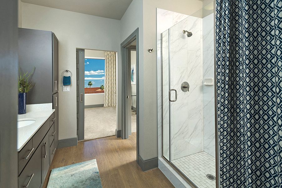 Carrara-tile surround showers