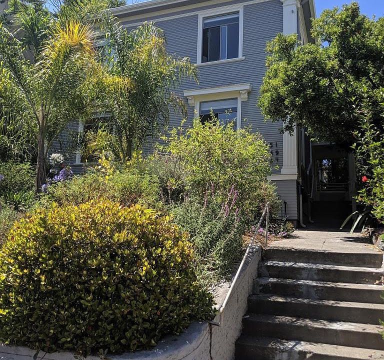 Street view of duplex. Landscaping professionally created and maintained.