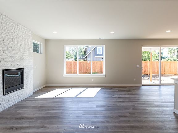 Photos are of the Huntington plan at Holley Brooke Lot 16, and may depict enhancements and/or upgrades that are not available with every plan.