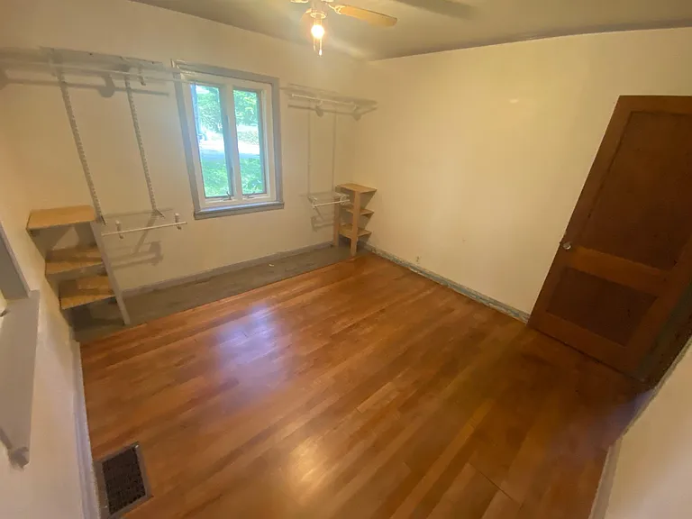 Large bedroom with open closet