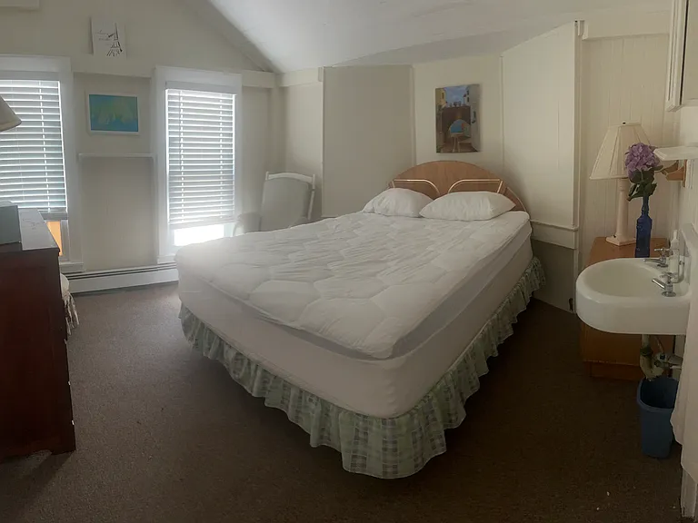 Upstairs Oceanfront bedroom 2 with queen and in room sink vanity