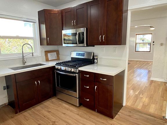 All new kitchen cabinets and flooring