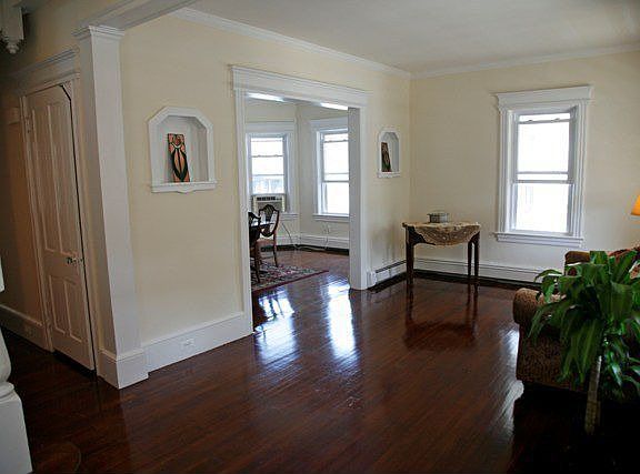 Living room opens to hall, dining rm 