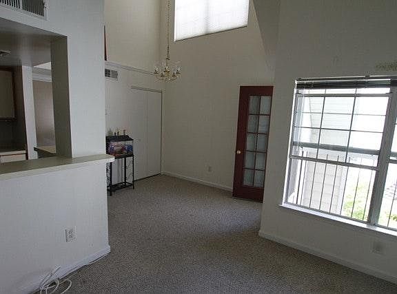living room with view of dining area