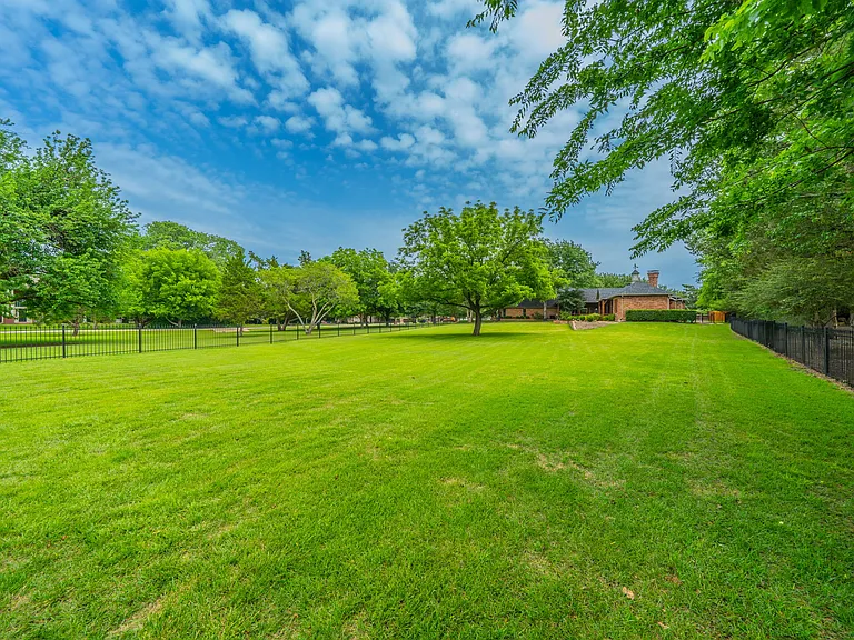 Private & Secluded: Large Fenced Yard with Lush Tree-Lined Privacy