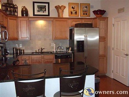 Kitchen with maple cabinets, granite, stainless steel appliances