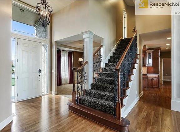 Spacious Entry, Custom Pattern wrought iron Spindles-Stairs and Loft Banister. Full view exterior windows. Security cameras:front door, foyer, garage, patio door, deck. Five Keyless entry points.