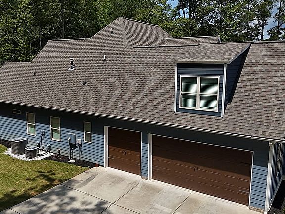 2.5 car garage with 8’ doors