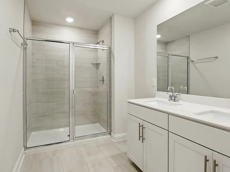 Master Bathroom - Featuring dual vanities and walk-in Shower!