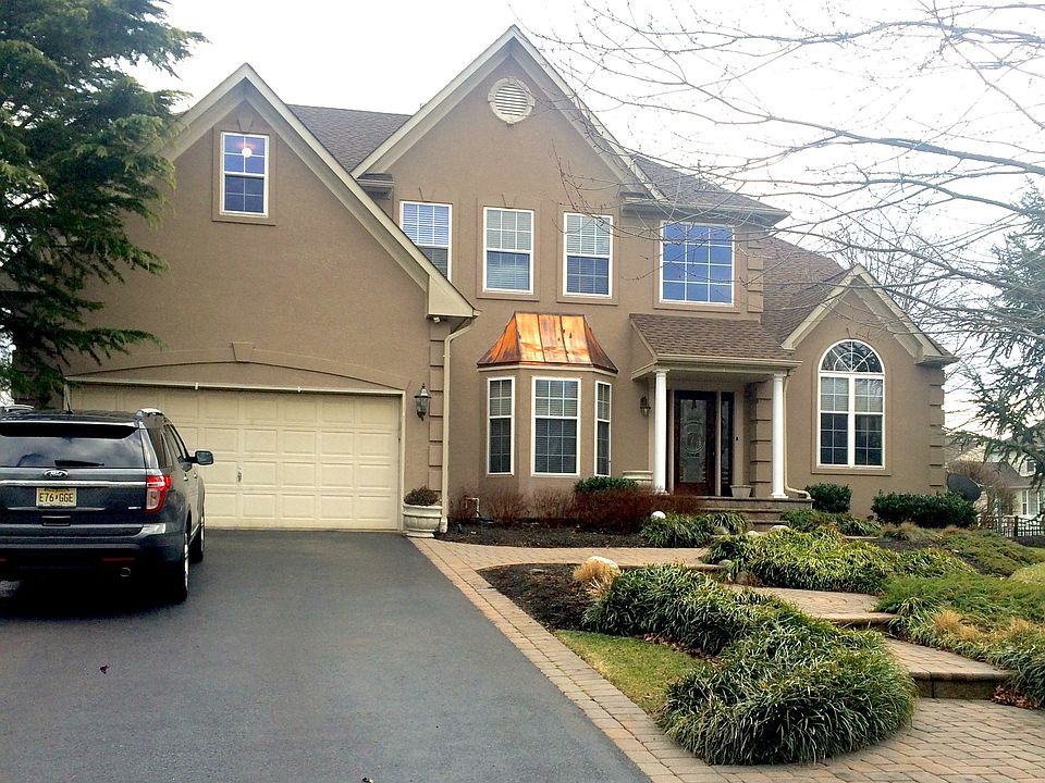 New Stucco Facade and Roof
