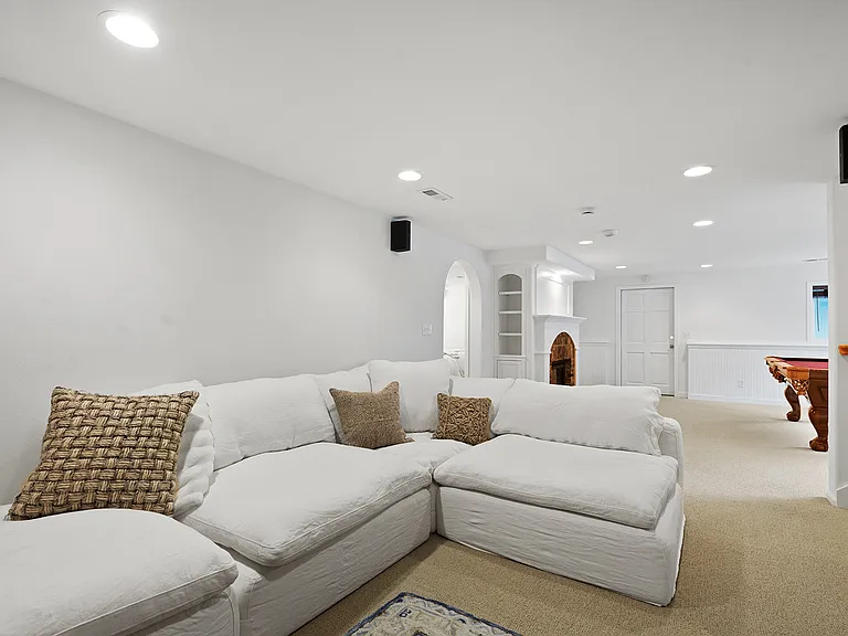 Media/Bonus Room with gas fireplace and Pool Table area