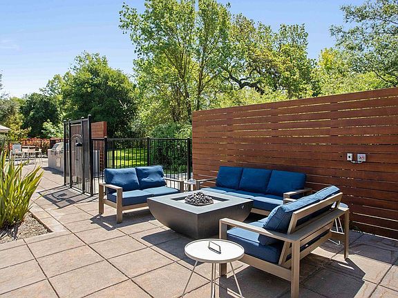 Firepit in the pool area at Renaissance Apartment Homes in Santa Rosa