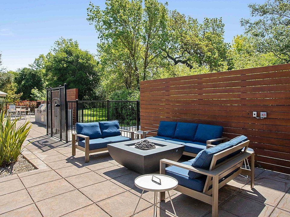 Firepit in the pool area at Renaissance Apartment Homes in Santa Rosa