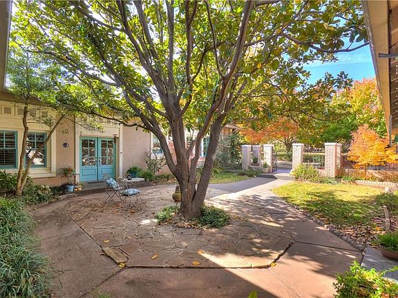 A view of the pretty Pella doors, this courtyard has a kind of Mediterranean feel to it.