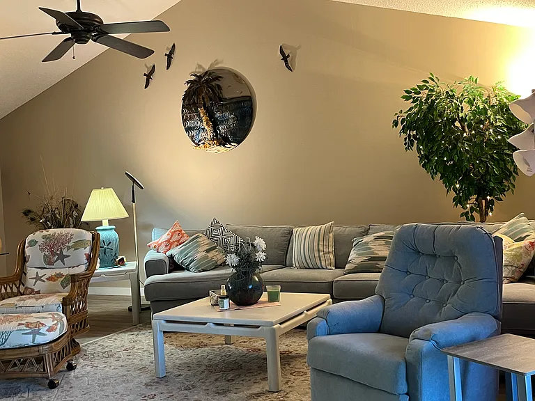 Large living room with vaulted ceiling and open floor plan.