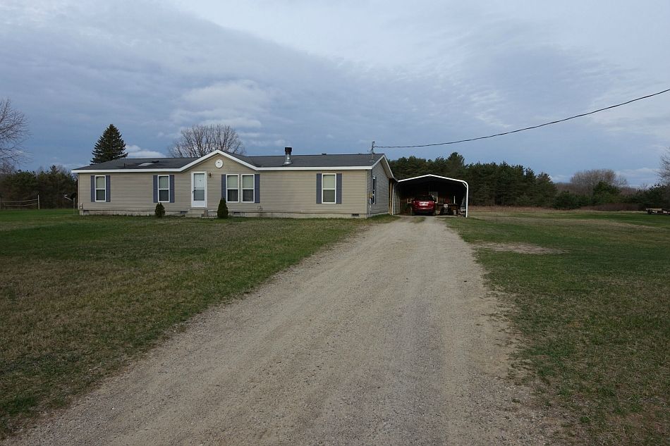 32.14 acres, with creek frontage and a hunting cabin on the creek bank,over looking the creek.Watch the deer from your dining room table.br /You are about 13 minutes from the MIdland Mall.br /This home has 4 bedrooms and 2 bathrooms