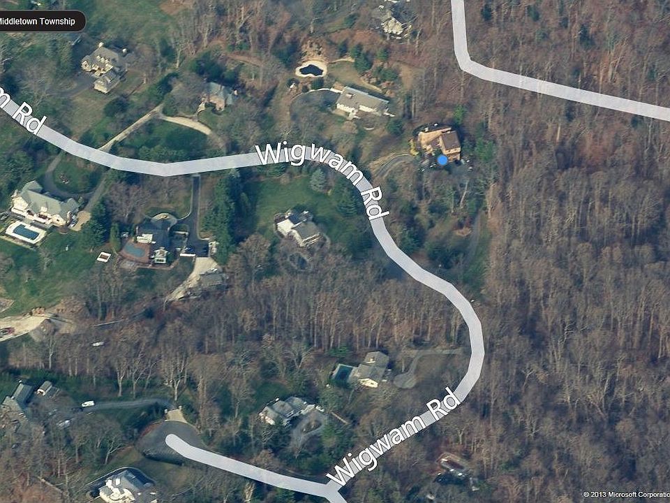 surrounded by woods and see Navesink River