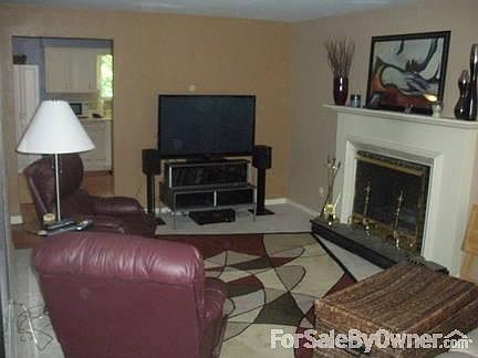 Living room
						:
						Spacious 11 x 21 room with wood burning fireplace