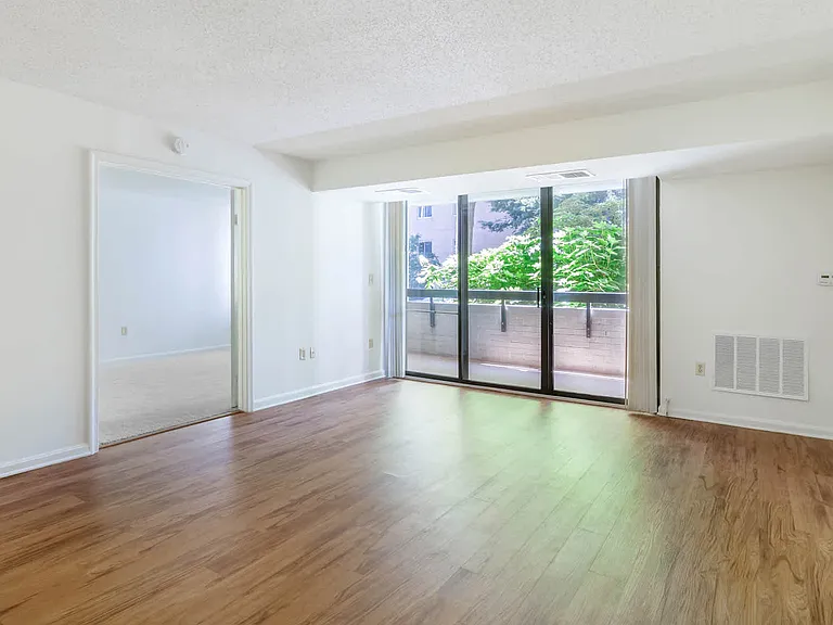 Living Room with Balcony and Hard Surface Flooring
