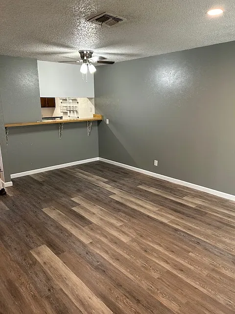 living room/dining room area with small closet not pictured