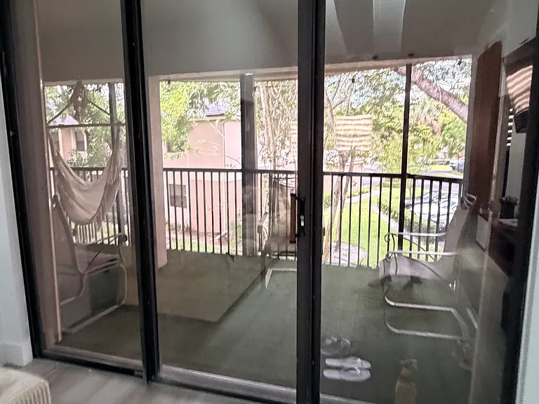 Living Room access to balcony via sliding door.