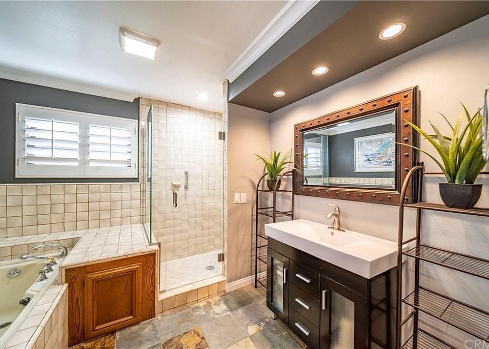 Huge Bathroom. Left - Whirpool Bathtub , Right - Shower