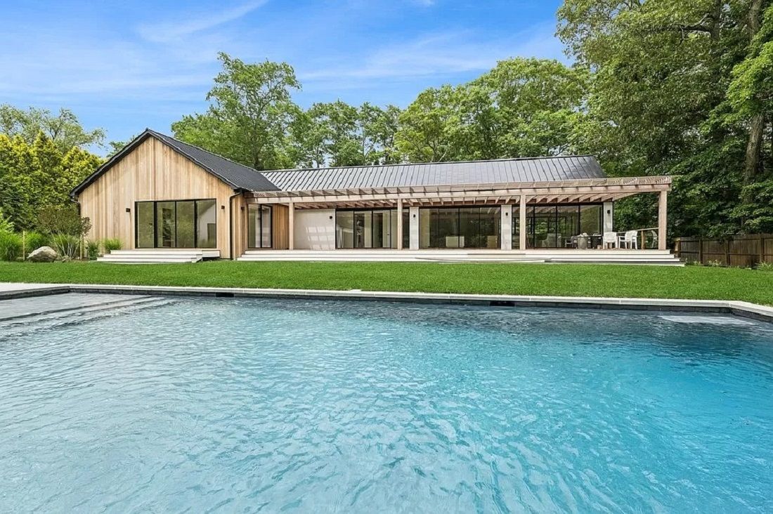  Huge back deck with mahogany pergola step down to the pool